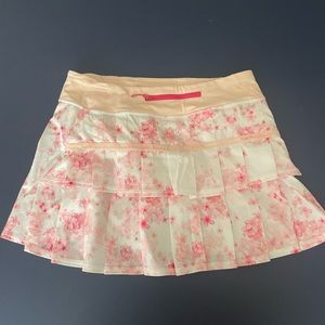 Like new, Lululemon vintage tennis skirt. Pink and white with flowers. Size 6